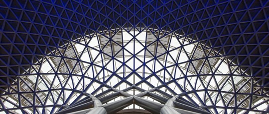LONDON - APRIL 13, 2013: Architecture detail inside King's Cross railway station. The annual rail passenger usage between 2011 - 2012 was 27.874 million.