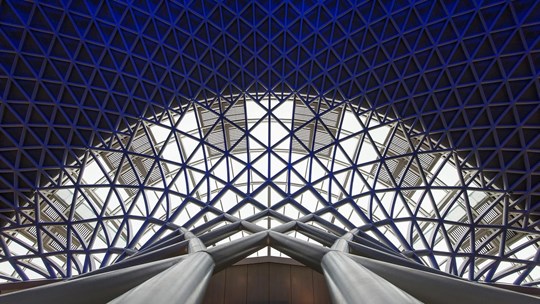 LONDON - APRIL 13, 2013: Architecture detail inside King's Cross railway station. The annual rail passenger usage between 2011 - 2012 was 27.874 million.