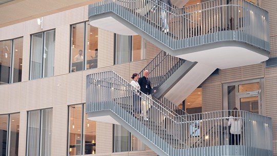 People walking the stairs in Tietoevry office