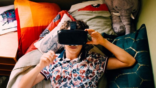 young man in VR goggles