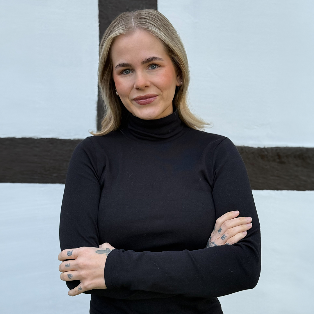 Silje Lilly is our Team Leader in fraud prevention.  She is dressed in a black polo shirt.