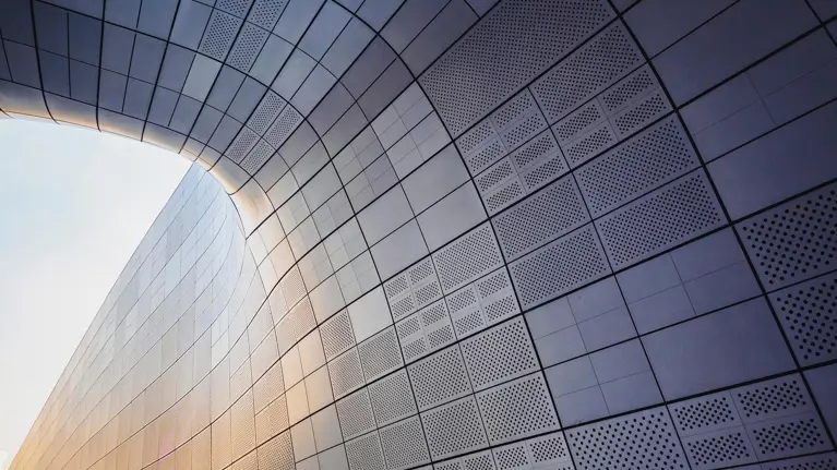 Architecture details Modern building Futuristic Metal wall design Curve and space